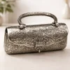 Ornate silver metal clutch