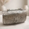 Ornate silver metal clutch