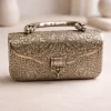Ornate silver metal clutch