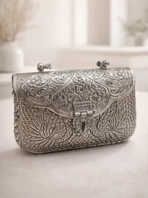 Ornate silver metal clutch
