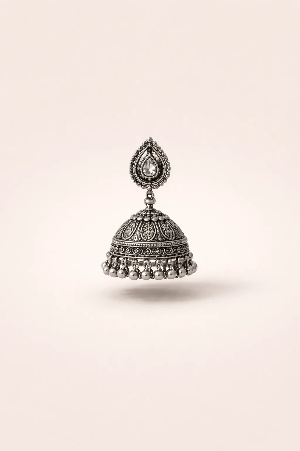 task_01kmnjtqbpffvswck3637y9mxm_1774545900_img_0 3 layered German silver necklace